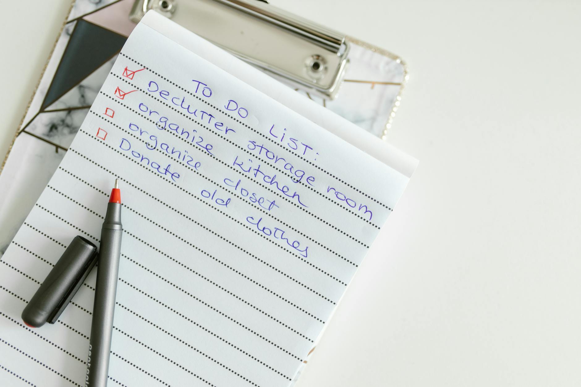 list written in a notepad with pen